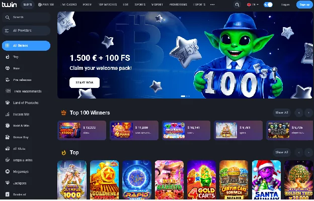 Twin Casino lobby with the welcome pack banner and the Top 100 Winners row
